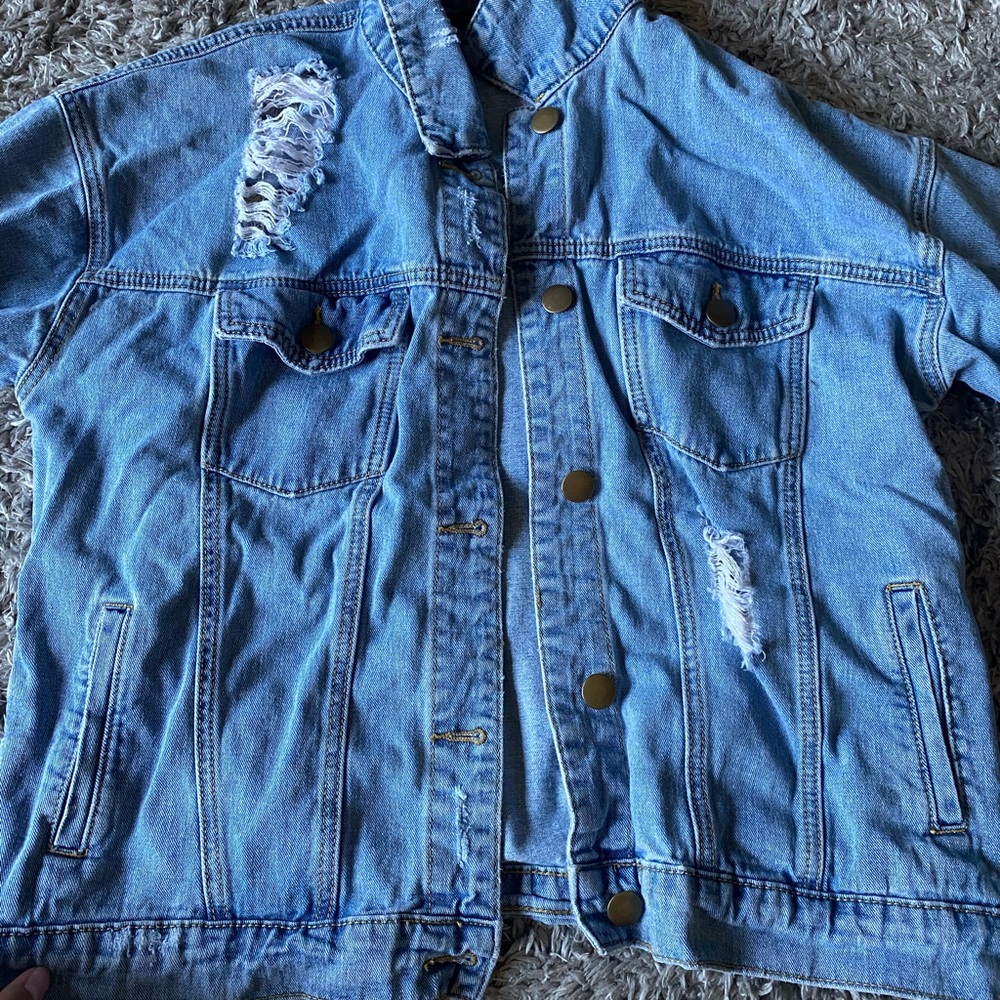 Distressed jean jacket